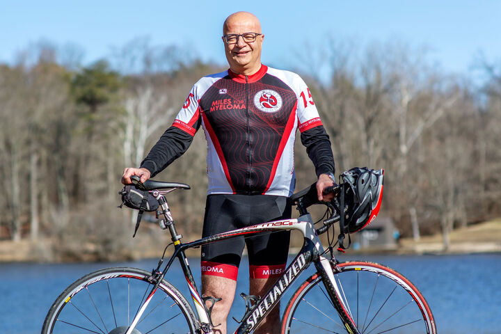 Dr. Rafat Abonour stands with his bicycle